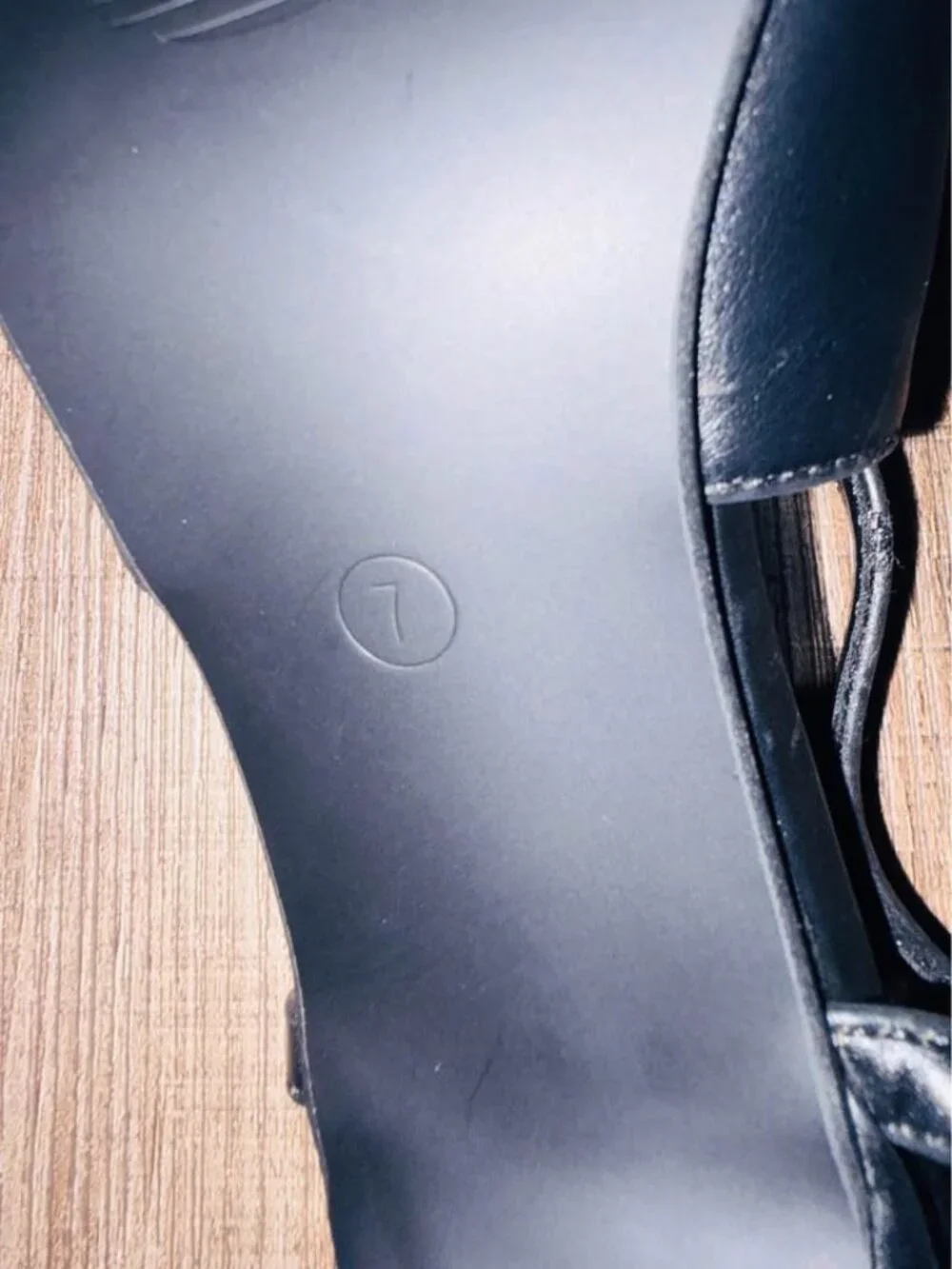 black slingback pointed-toe flats from